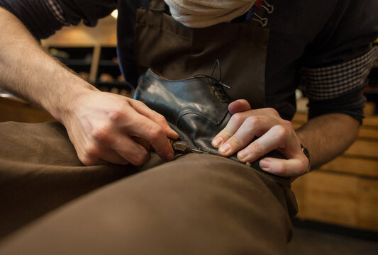 Working Male Shoemaker Close-Up