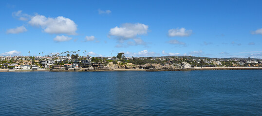 Fototapeta na wymiar Corona del Mar, California seen from West Jetty View Park on the Balboa Peninsula.