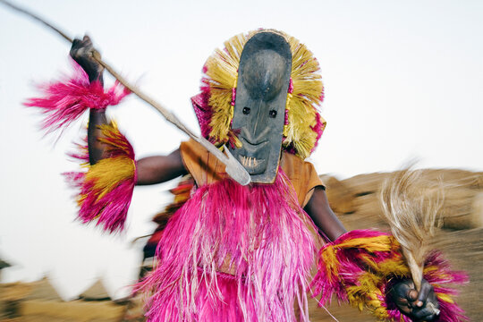 Africa, West Africa, Mali, Dogon Country, Bandiagara escarpment, Masked Ceremonial Dogon Dancer near Sangha