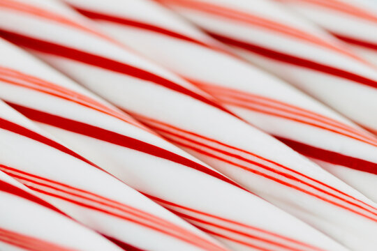Peppermint striped candy canes lined diagonally