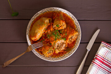 Cabbage rolls with meat, rice and vegetables. Chou farci, dolma, sarma, golubtsi or golabki. View from above, top view