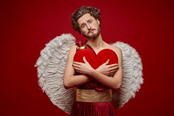 sad angel with a heart