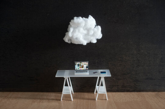 Cloud floating over work desk