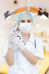 Female Medical Worker Holding a Syringe