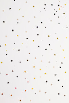 Starry and circular background pattern on white