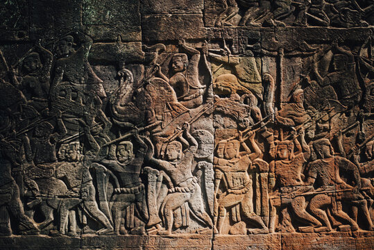 Ancient Relief in Stone in Bayon Temple Depicting Battle