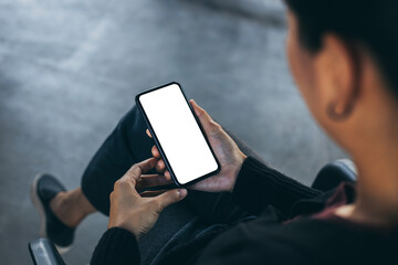 cell phone blank white screen mockup.woman hand holding texting using mobile on desk at office.background empty space for advertise.work people contact marketing business,technology