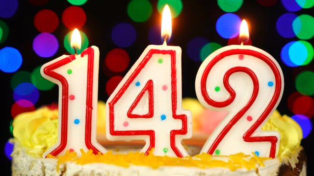 Number 142 Happy Birthday Cake With Burning Candles Topper.