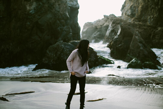 girl exploring pfeiffer beach