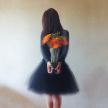 Slightly blurred image of woman, with face hidden, holding a vase filled with bright orange flowers