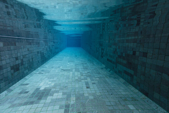 Empty swimming pool underwater