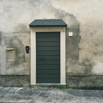 Door in ancient building in Italy
