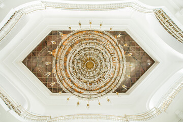 Chandelier on ceiling look from down.