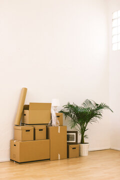 Stack of cardboard boxes in the new home.