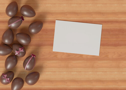 3D Illustration. Chocolate easter eggs with blank paper.