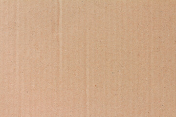 Cardboard sheet texture background, detail of recycle brown paper box pattern.