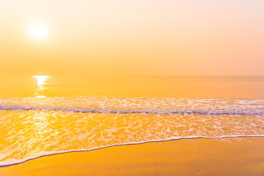 Beautiful tropical beach sea ocean with sky at sunrise or sunset