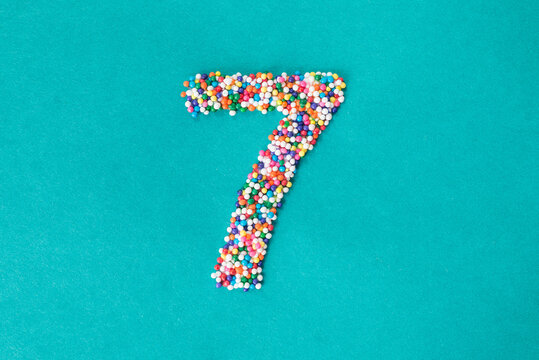 The number seven built from nonpareils