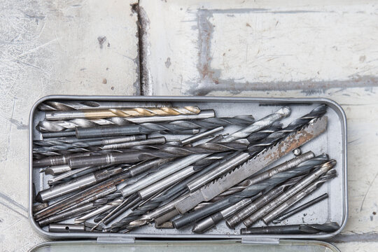 Metal box full of different sizes of drills