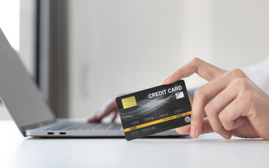 Online product purchase, Businessman use laptop register via credit cards to make online purchases, Shopping and mail, credit card online security, Online shopping concept.