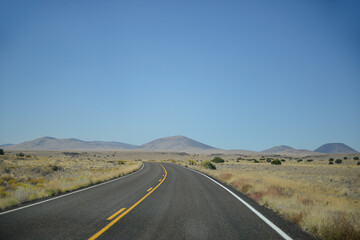 Fototapeta na wymiar Open Road into the Desert