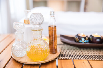 Close up of Essential Oil bottle at beauty spa salon for Relaxing oil massage