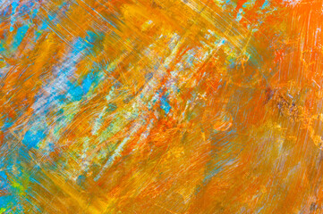 colorful creative motley background: smudged residues of oil paints on a wooden palette, short...