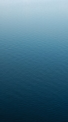Vertical photography of a calm water surface © Danila Shtantsov