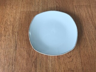 Square plate one of eating utensils