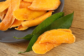 dried mango on wooden background