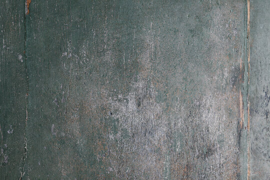 Old pitted cracked wood panel texture