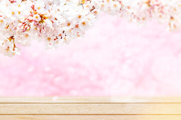 Naklejka na ściany i meble Spring cherry blossom background with wood grain board at the bottom 5825