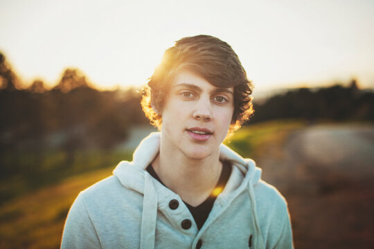 Handsome teen boy portraits at sunset