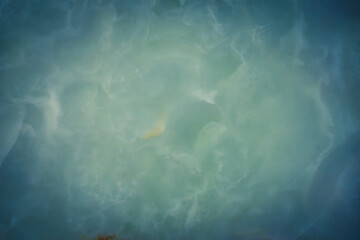 Details of the surface, a close-up shot, with a vignette on the cover and a bright dot in the center. Background or backdrop ideas.