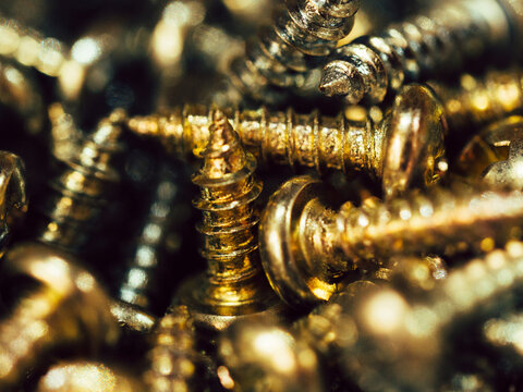 macro of a box full of screws