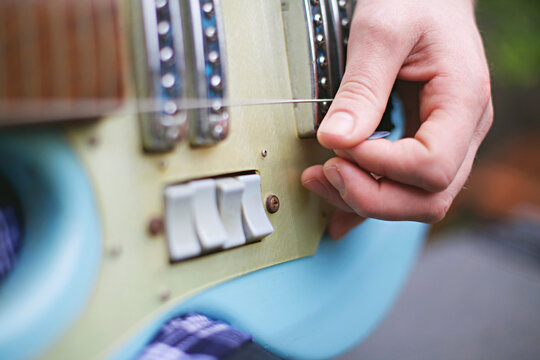 close up of one stringed guitar
