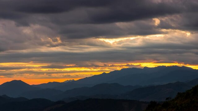 Time lapse view of colorful sunrise landscape mountain in Huai Thon Village, Nan, Thailand. Footage timelapse nature landscape view and colored sky.