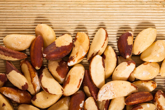 Tasty brazil nuts closeup on wooden surface. High quality photo