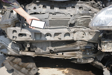 hand take photo of crashed damaged broken car. automobile crash accident
