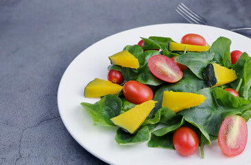 Healthy salad, Fresh watercress and cherry tomatoes. food background