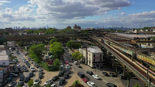 Aerial Orbit View of Elevated Subway Trains Near Broadway Junction