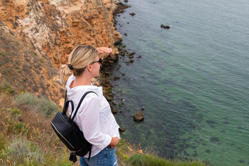 Woman at a coastline