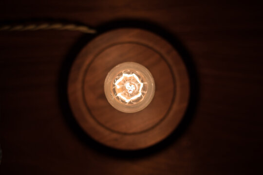 Looking down at an Edison lightbulb from above