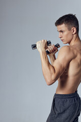 Fototapeta na wymiar sporty man naked torso workout motivation exercise