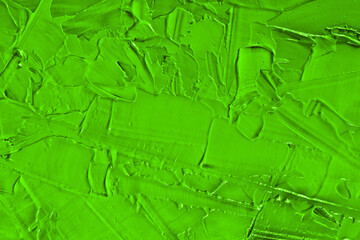 Green abstract texture of surface covered with putty. Grain and noise effect.  Wall background...