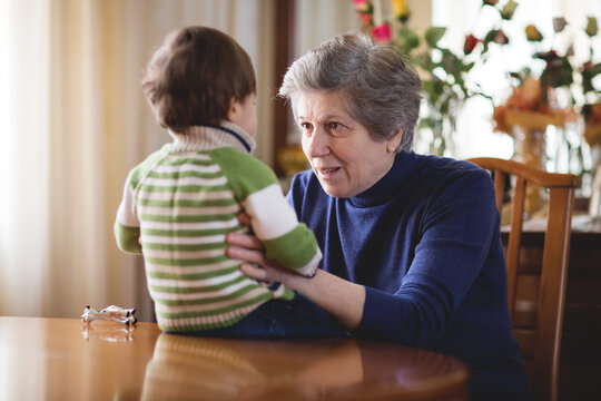 Grandmother talking to her grandson