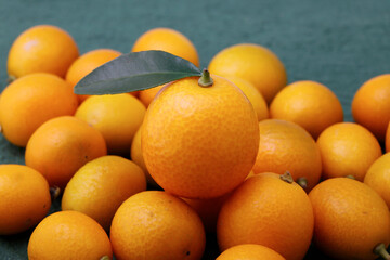 Macro photo of a small kumquat