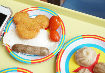 deep fried hasbrown and grill potato on colorful dish