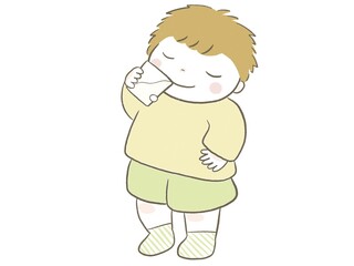 腰に手を当て牛乳を飲む子供