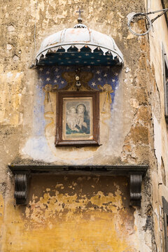 Painting of Madonna and Child hanging on a facade